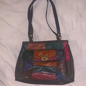 Vintage patched leather shoulder bag